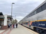 People standing on the platform at Merced Station